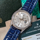 Close-up detail view of Rolex unisex gold watch