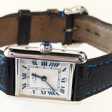 Close-up detail view of Cartier unisex silver watch