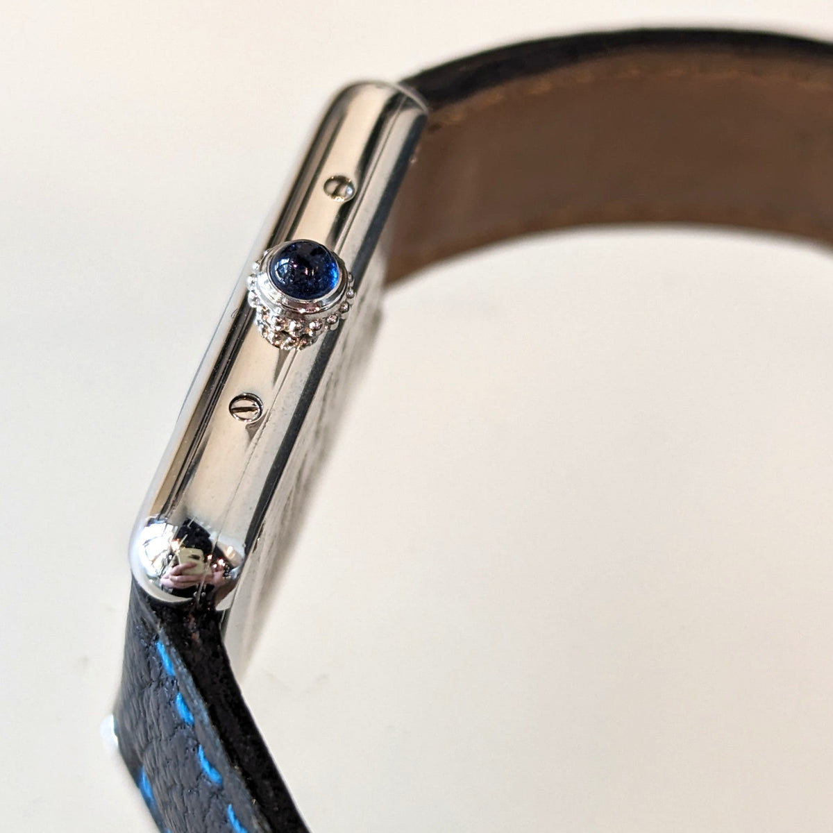 Front view of Cartier unisex silver watch