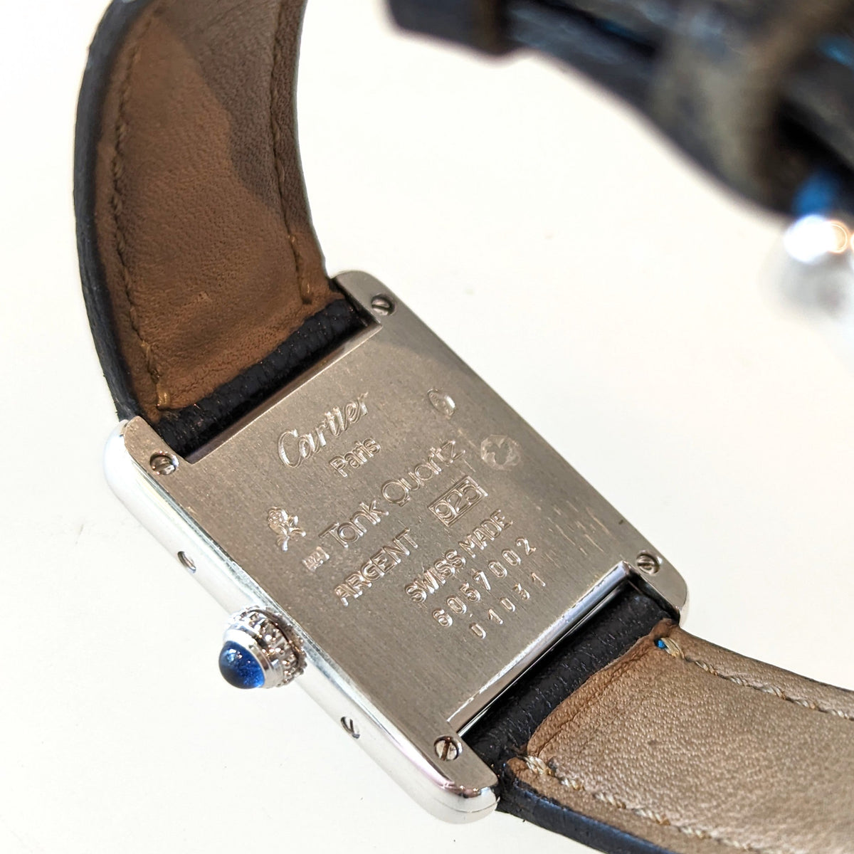 Angled view of Cartier unisex silver watch