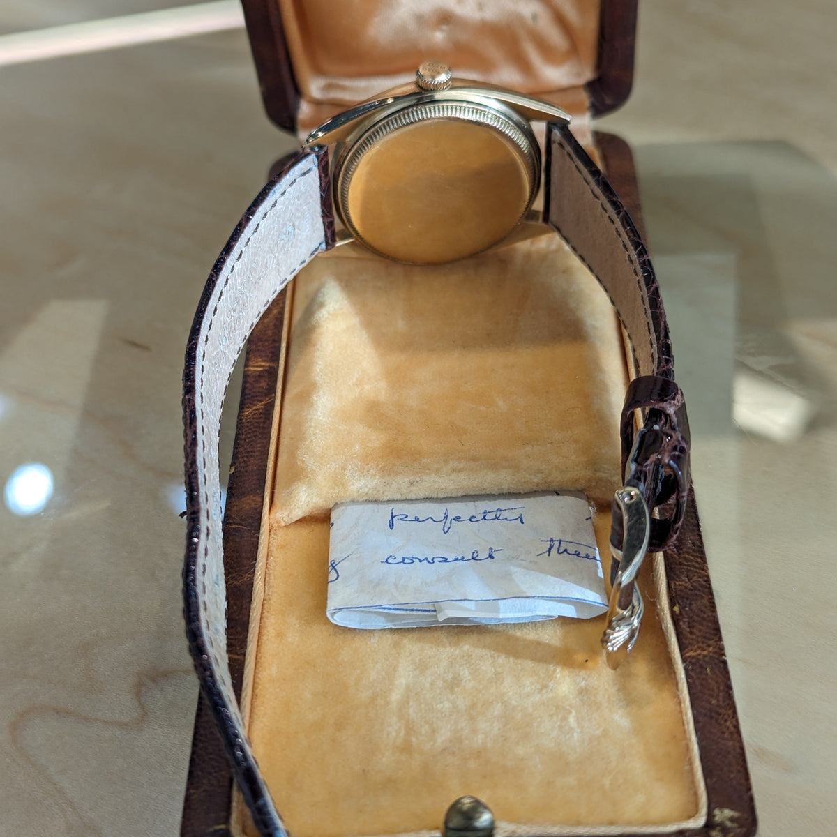 Front view of Rolex unisex gold watch