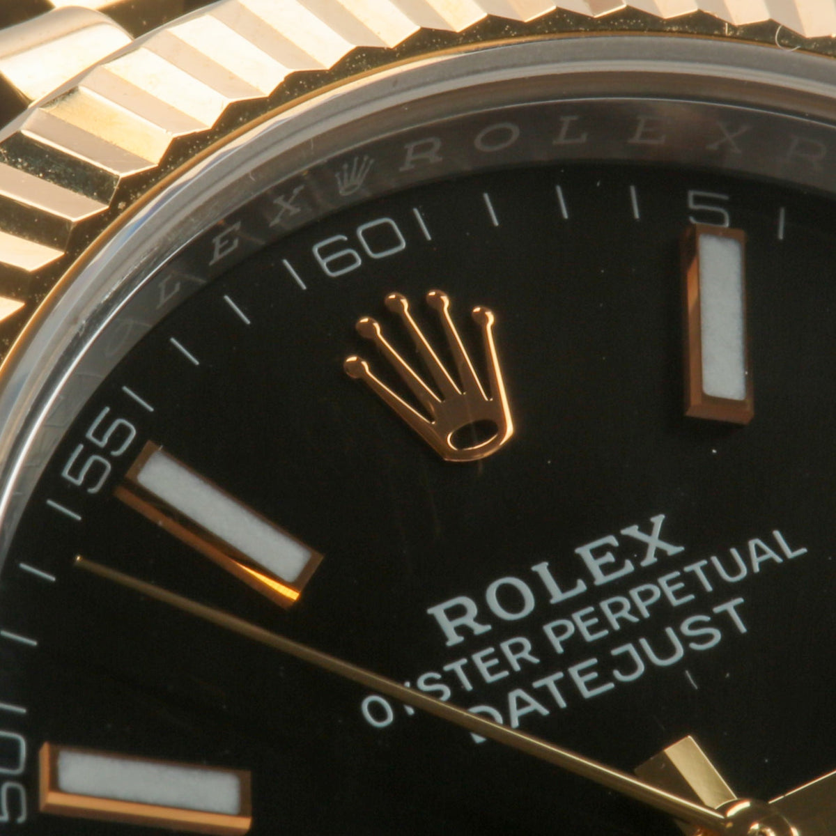 Close-up detail view of Rolex unisex two tone watch