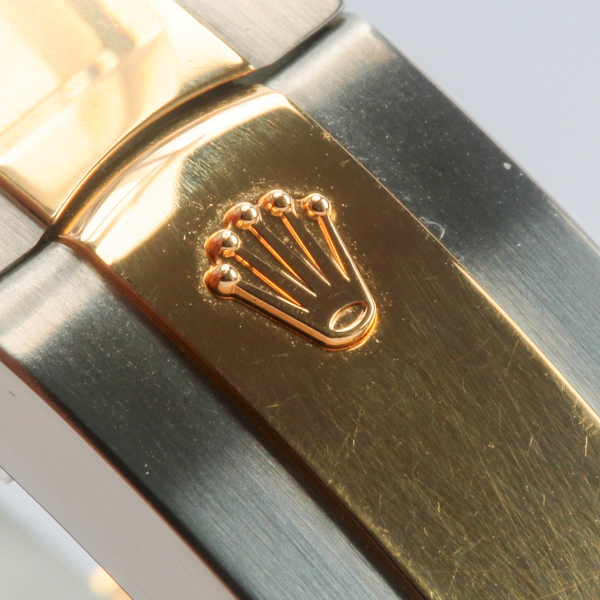 Side view of Rolex unisex two tone watch