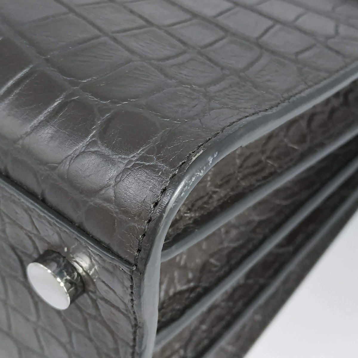 Close-up of Classic bags hardware and fine stitching