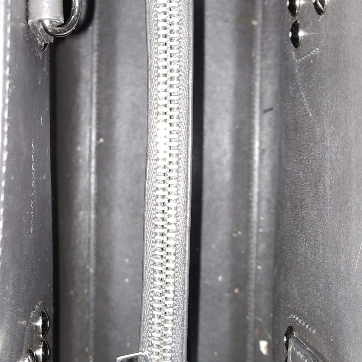 Close-up of Classic bags hardware and fine stitching