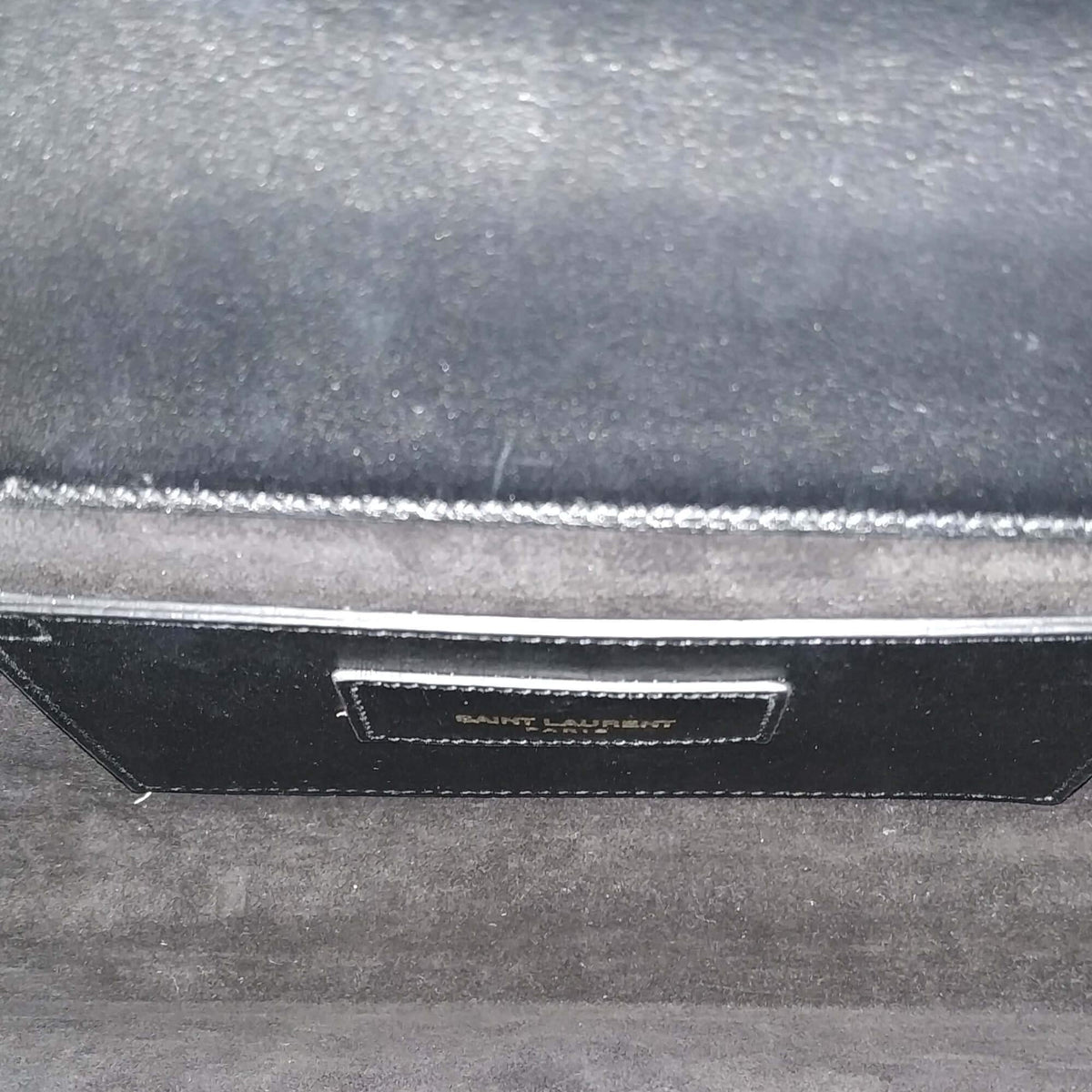 Close-up of Classic bags hardware and fine stitching