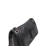 Close-up of Medium bags hardware and fine stitching