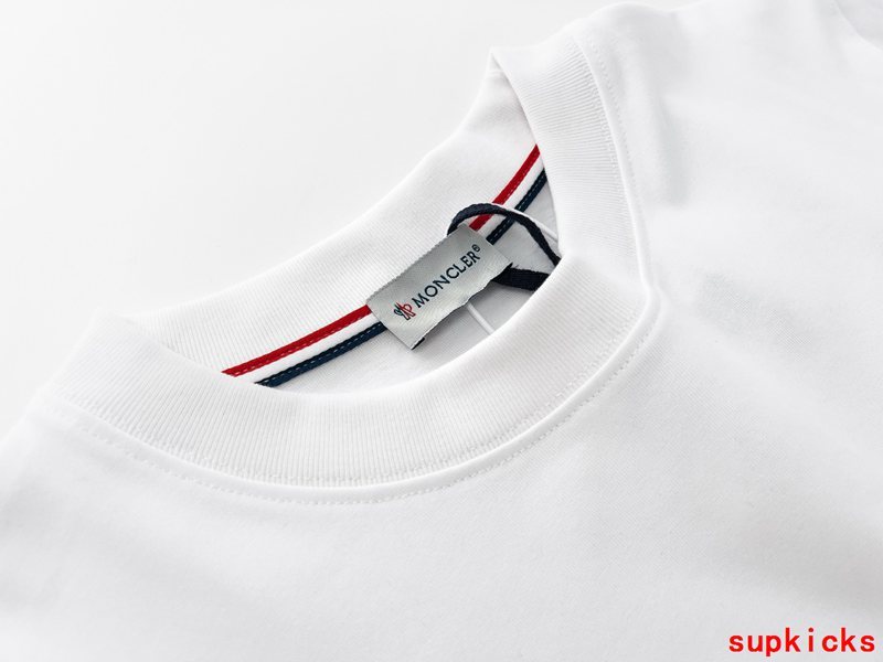 Full styled look of Moncler luxury clothing with logo-detail design