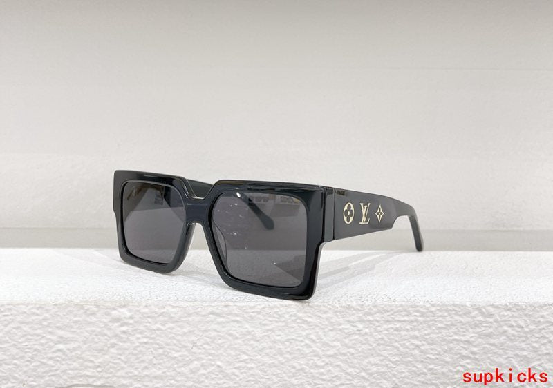 Close-up detail view of Louis Vuitton unisex sunglasses