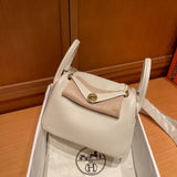 Side view of poised structured handbag