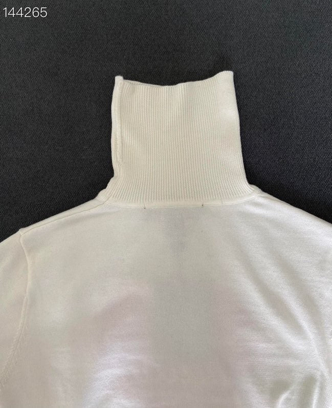 Close-up detail shot of Louis Vuitton luxury clothing with everyday silhouette