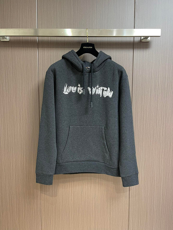 Front view of Louis Vuitton luxury clothing with signature branding