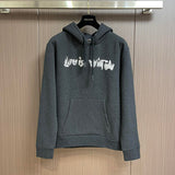 Front view of Louis Vuitton luxury clothing with signature branding