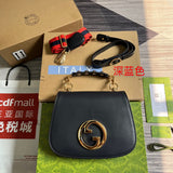 Styled lifestyle shot of signature polished women's handbag – women's luxury handbag
