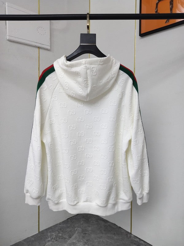 Side profile of Gucci luxury clothing with label-forward styling