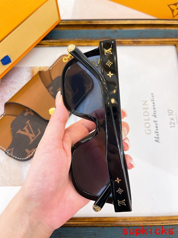 Angled view of Louis Vuitton unisex sunglasses