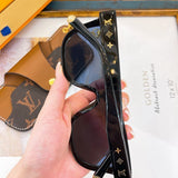 Angled view of Louis Vuitton unisex sunglasses