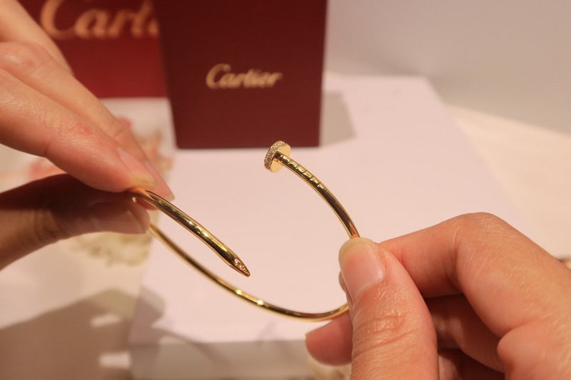 Side view of Cartier unisex jewelry piece
