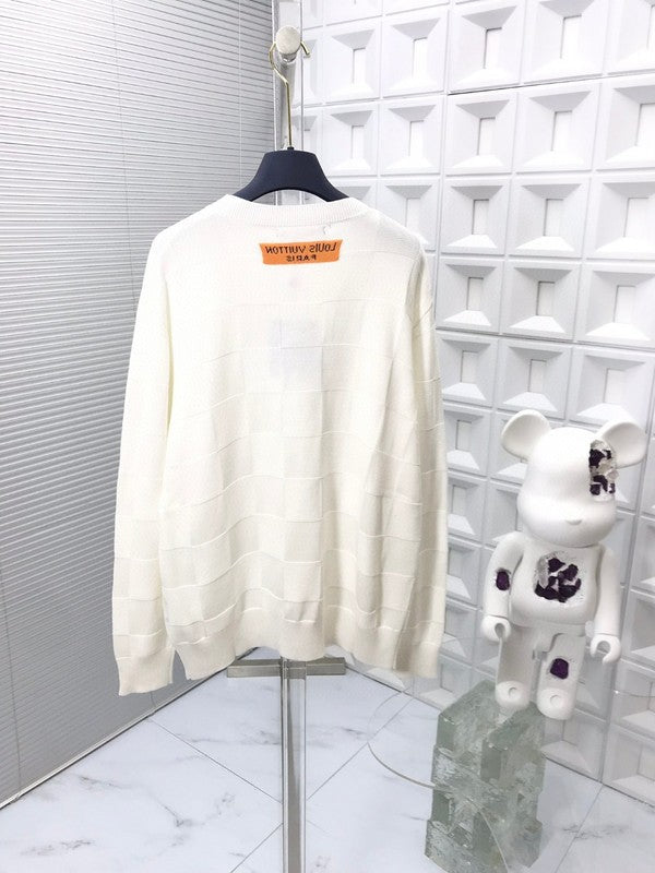 Back view of Louis Vuitton luxury clothing with signature branding