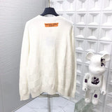 Back view of Louis Vuitton luxury clothing with signature branding