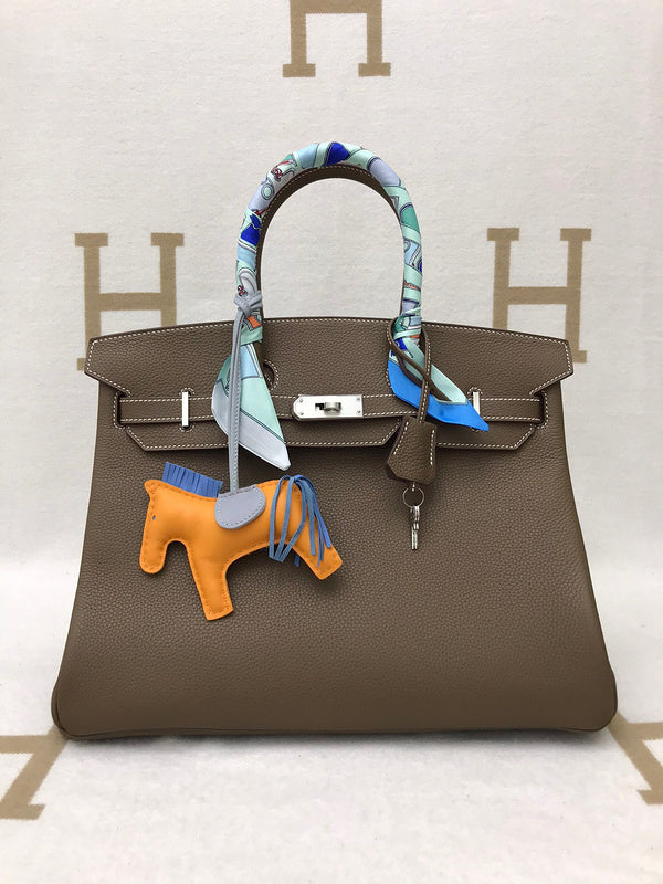 Side view of refined structured handbag