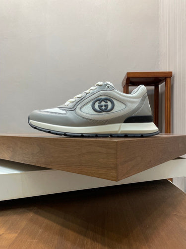 Gucci Streetwear sneakers in neutral cream signature lace-up style front view