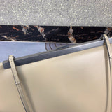 Back view of sleek modern women's handbag – women's luxury accessory