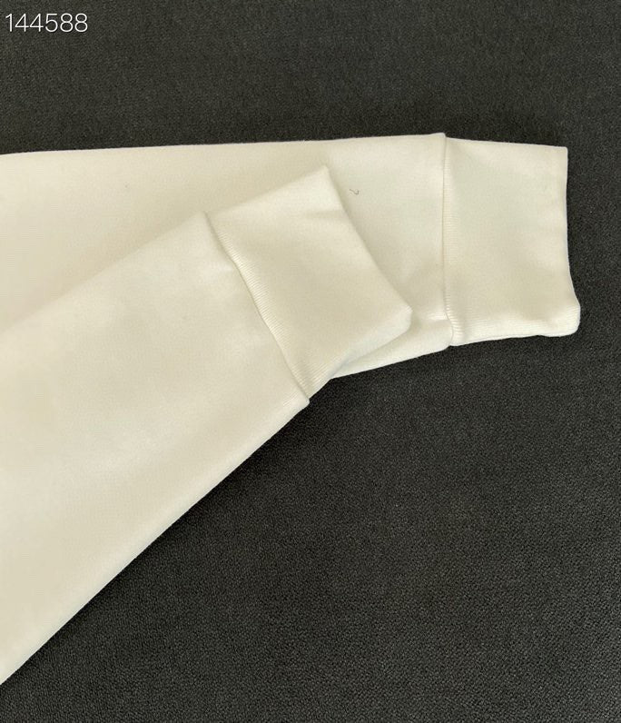 Close-up detail shot of Louis Vuitton luxury clothing with contemporary cut