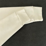 Close-up detail shot of Louis Vuitton luxury clothing with contemporary cut