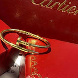 Front view of Cartier unisex jewelry piece