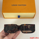 Angled view of Louis Vuitton unisex sunglasses
