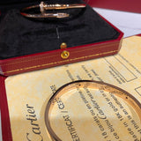 Close-up detail view of Cartier unisex jewelry piece