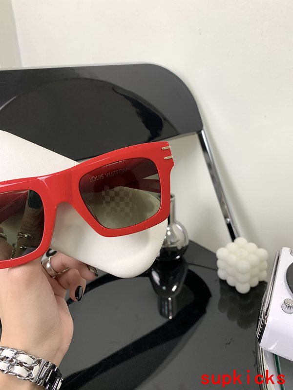 Close-up detail view of Louis Vuitton unisex sunglasses