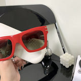 Close-up detail view of Louis Vuitton unisex sunglasses