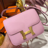 Side view of clean-lined structured handbag