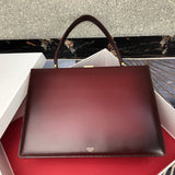 Side profile of everyday-luxe polished women's handbag – women's luxury handbag
