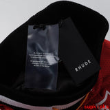 Flat lay presentation of Rhude luxury clothing with logo-detail design