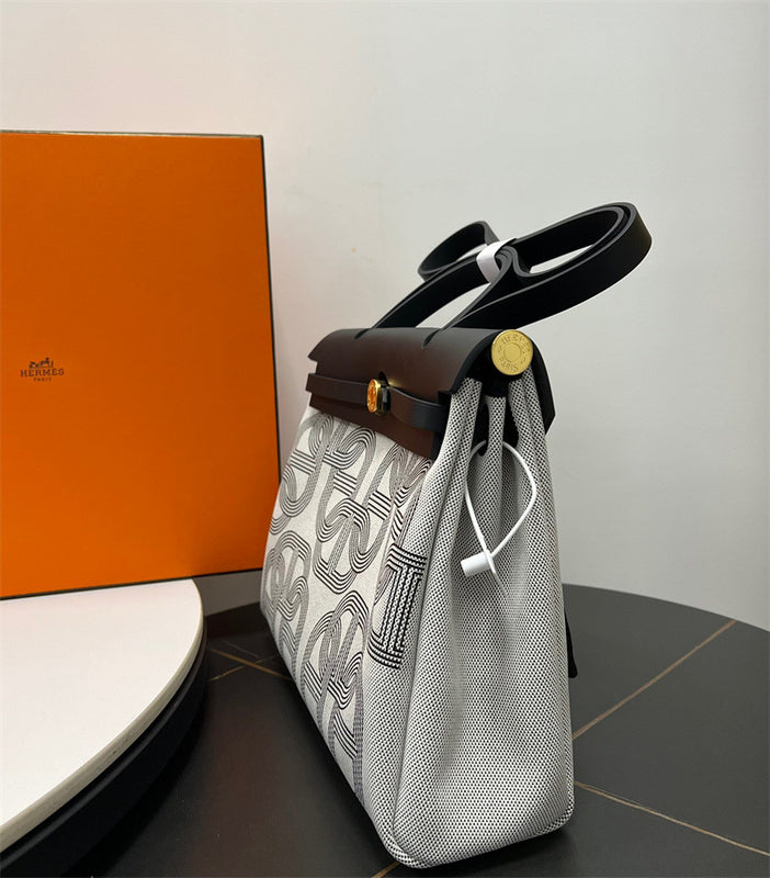  Everyday top-handle bag carried on shoulder