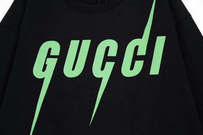 Flat lay presentation of Gucci luxury clothing with tailored silhouette