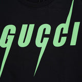 Flat lay presentation of Gucci luxury clothing with tailored silhouette