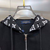 Close-up detail shot of Louis Vuitton luxury clothing with label-forward styling