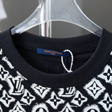 Close-up detail shot of Louis Vuitton cotton t-shirt with monogram-inspired silhouette