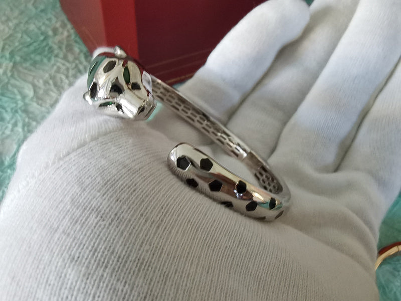 Front view of Cartier unisex jewelry piece