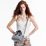  elegant top-handle bag styled with outfit 12