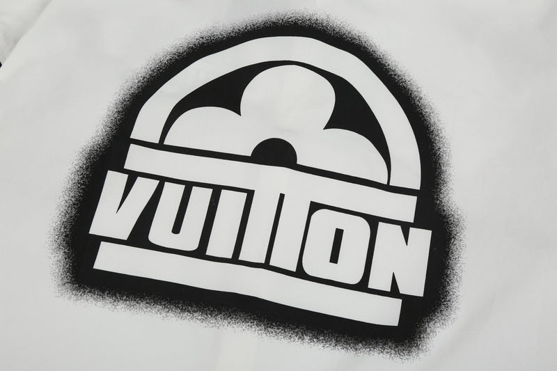 Flat lay presentation of Louis Vuitton luxury clothing with logo-detail design