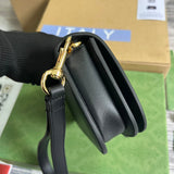 Front view of sleek polished women's handbag – women's statement bag