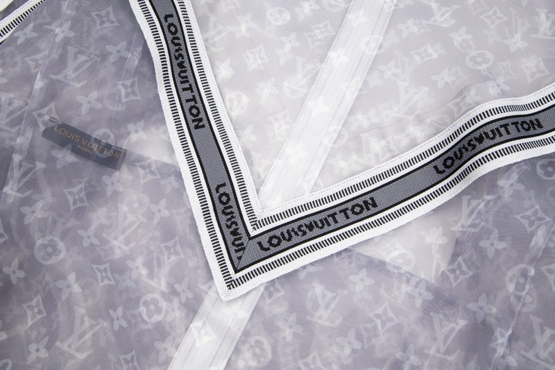 Full styled look of Louis Vuitton luxury clothing with monogram-inspired silhouette