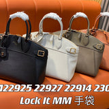  Refined tote bag carried on shoulder