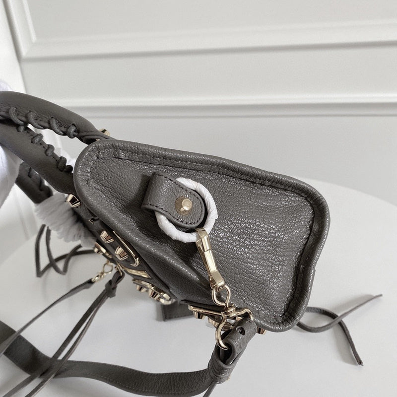 Zivas Charm Chic Craftsmanship Statement Handbag (Signature Shape & Finish) – Styled Look