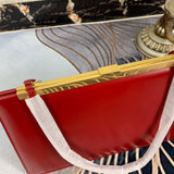 Styled lifestyle shot of chic sleek women's handbag – women's luxury accessory